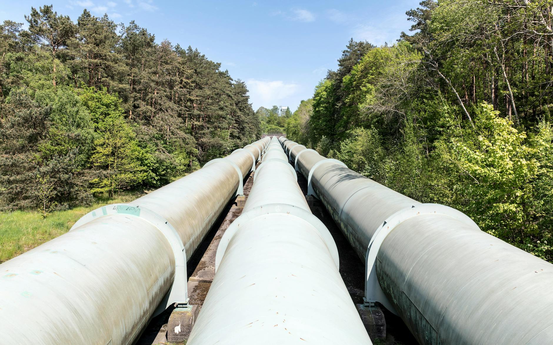 Large industrial pipeline infrastructure representing energy transportation systems