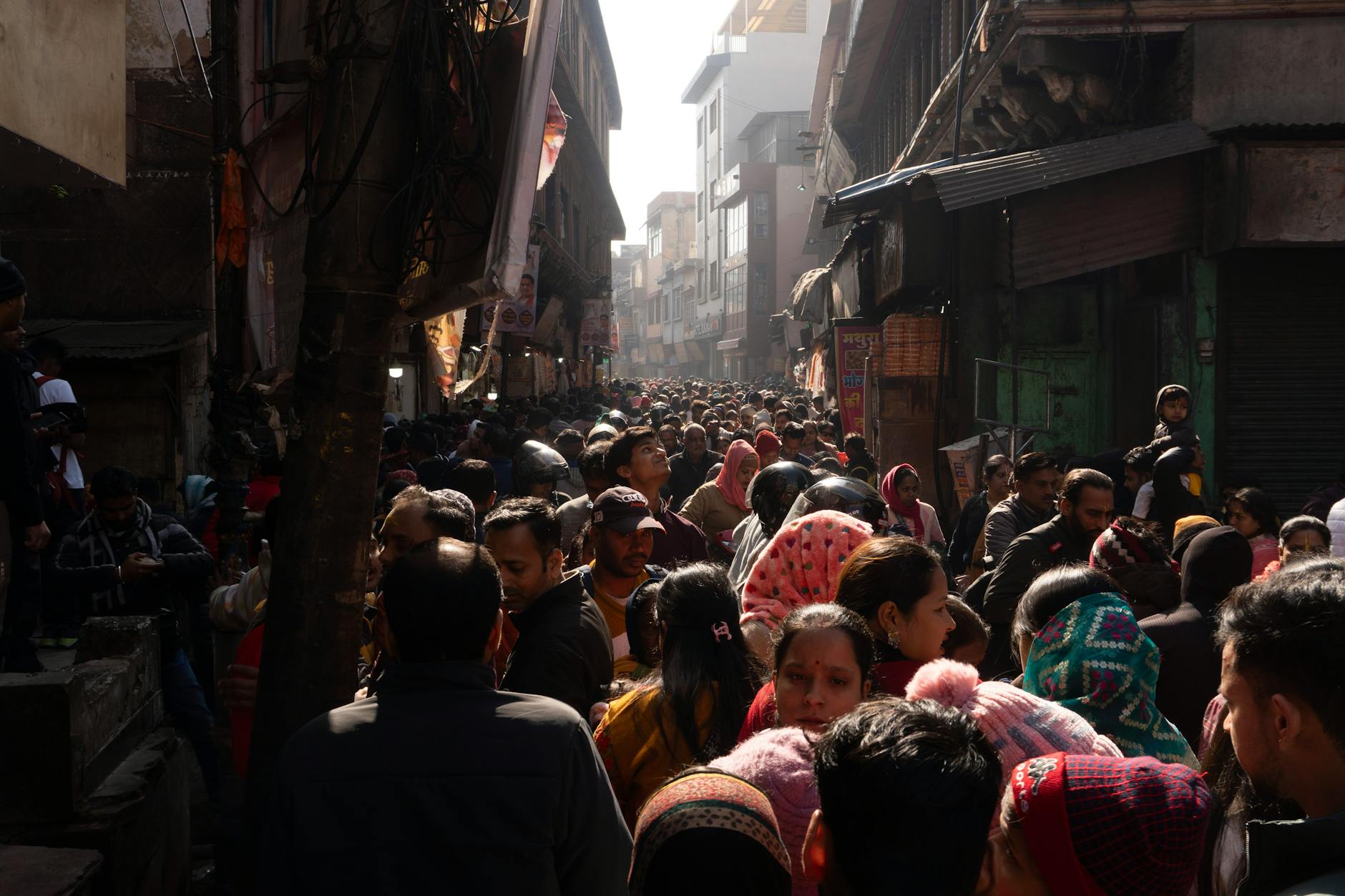 Busy street scene in India showing dense population and urban activity