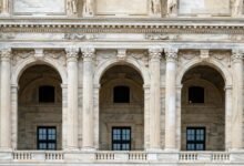 Classical government building with tall columns representing federal institutions and legislative chambers