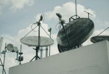 Large satellite dish pointing toward the sky for space communications