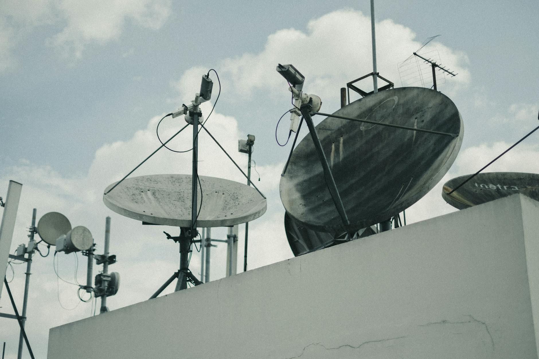 Large satellite dish pointing toward the sky for space communications