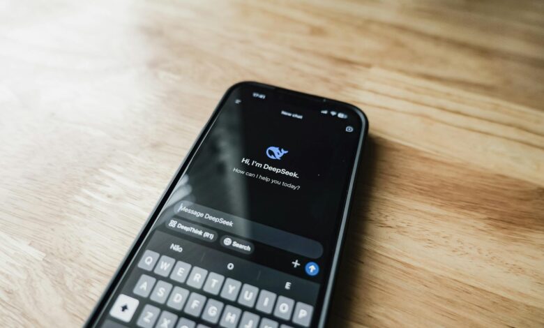 Close-up of smartphone displaying social media apps and notifications on screen