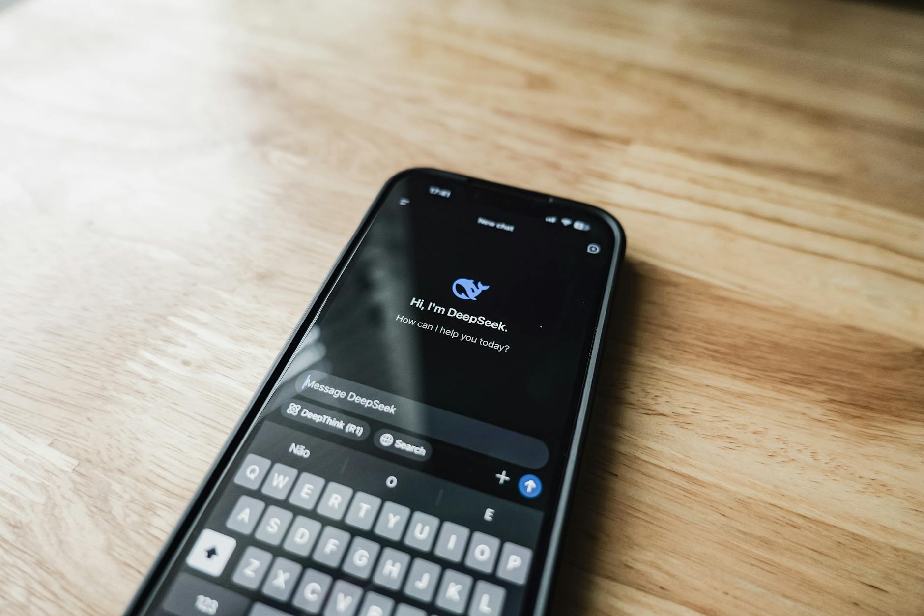 Close-up of smartphone displaying social media apps and notifications on screen