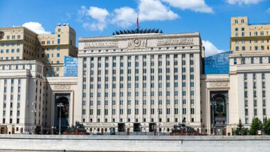 Modern government building with columns representing political leadership and governance