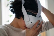 Person wearing VR headset for immersive digital experience