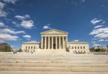 The United States Supreme Court building with its iconic columns and steps