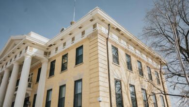 Modern courthouse building representing legal proceedings and regulatory investigations