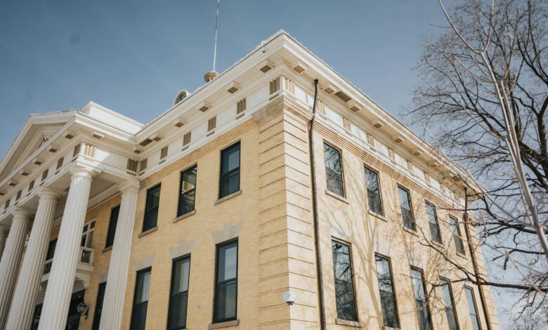 Modern courthouse building representing legal proceedings and regulatory investigations