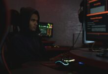 Close-up of computer screen displaying security warning messages and data protection alerts