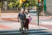 Elderly people walking on street representing Japan's aging population demographic challenge