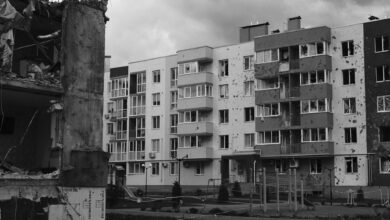 Building showing earthquake damage with cracked walls and structural issues