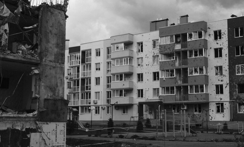 Building showing earthquake damage with cracked walls and structural issues