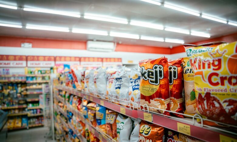 Modern grocery store interior with organized aisles and shopping carts