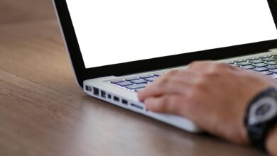 Close-up of computer screen displaying code and programming interface representing AI development