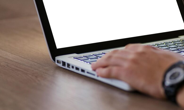 Close-up of computer screen displaying code and programming interface representing AI development