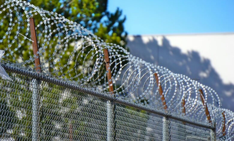 Military border fence representing India-Pakistan disputed territories