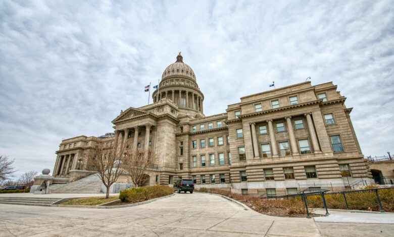 State government building with American flags representing political leadership