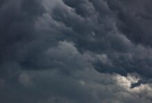 Dark storm clouds gathering in the sky before severe weather outbreak