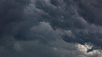 Dark storm clouds gathering in the sky before severe weather outbreak
