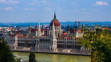 European Parliament building exterior showing architectural details and EU flags