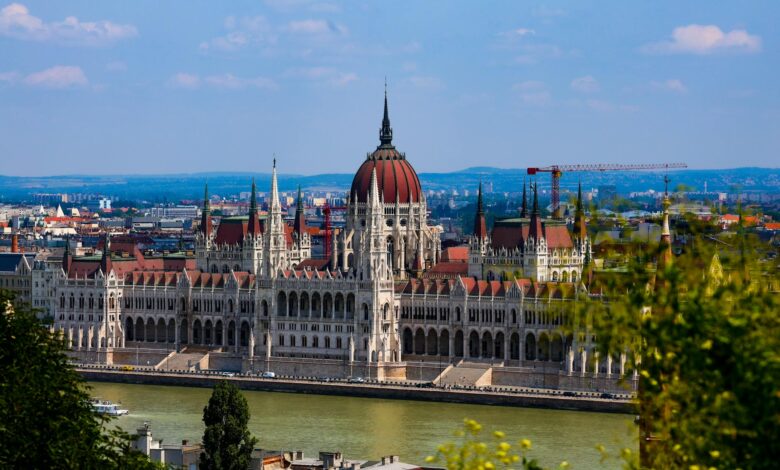 European Parliament building exterior showing architectural details and EU flags