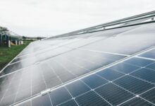 Solar panel installation with battery storage system showing renewable energy infrastructure