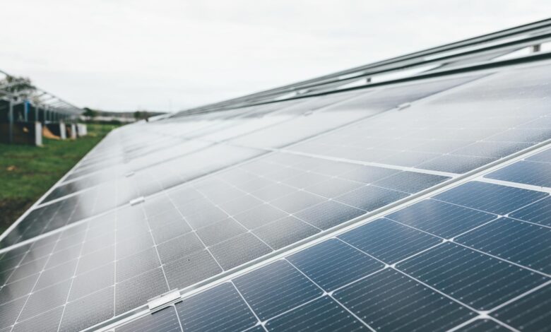 Solar panel installation with battery storage system showing renewable energy infrastructure