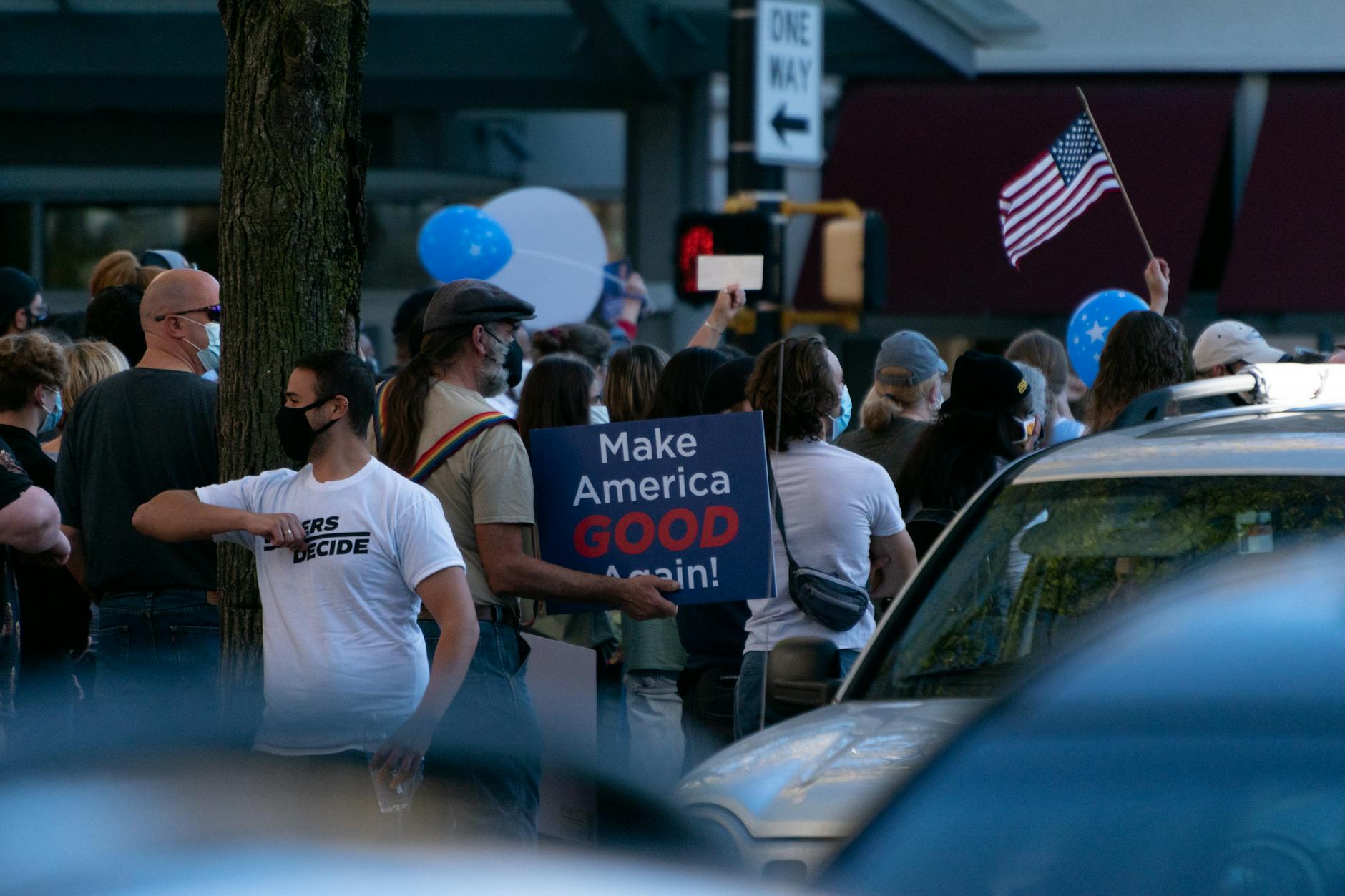 Large crowd at political campaign event showing voter enthusiasm