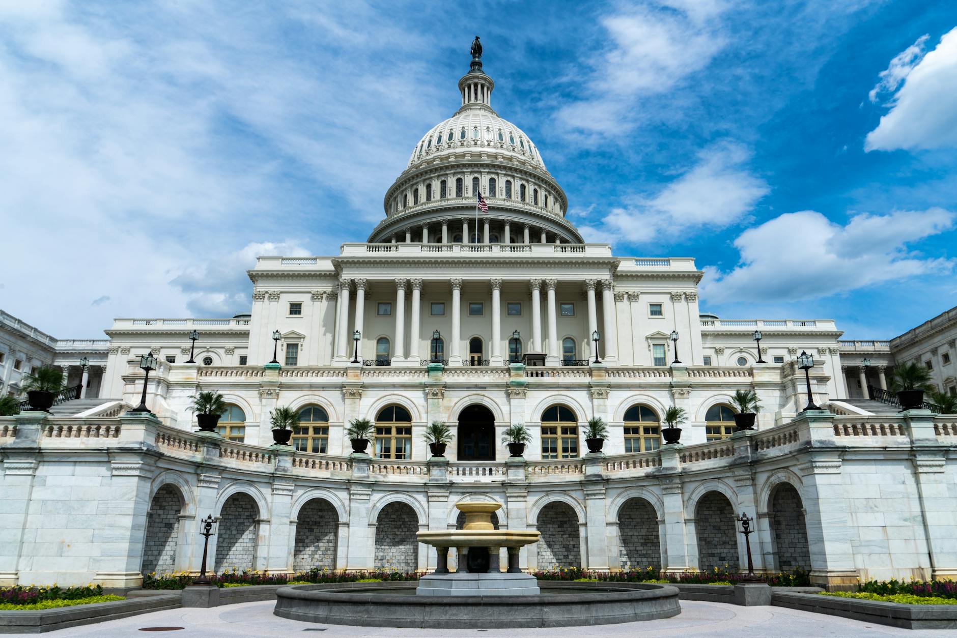 Federal government building with American flag flying prominently