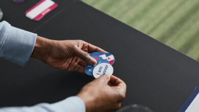 Busy campaign headquarters with staff working at desks and phones