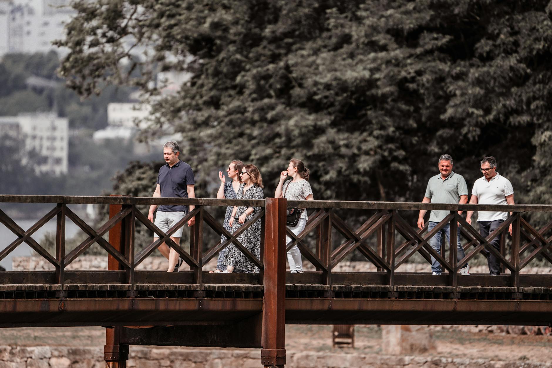 Small group of tourists walking together on guided tour