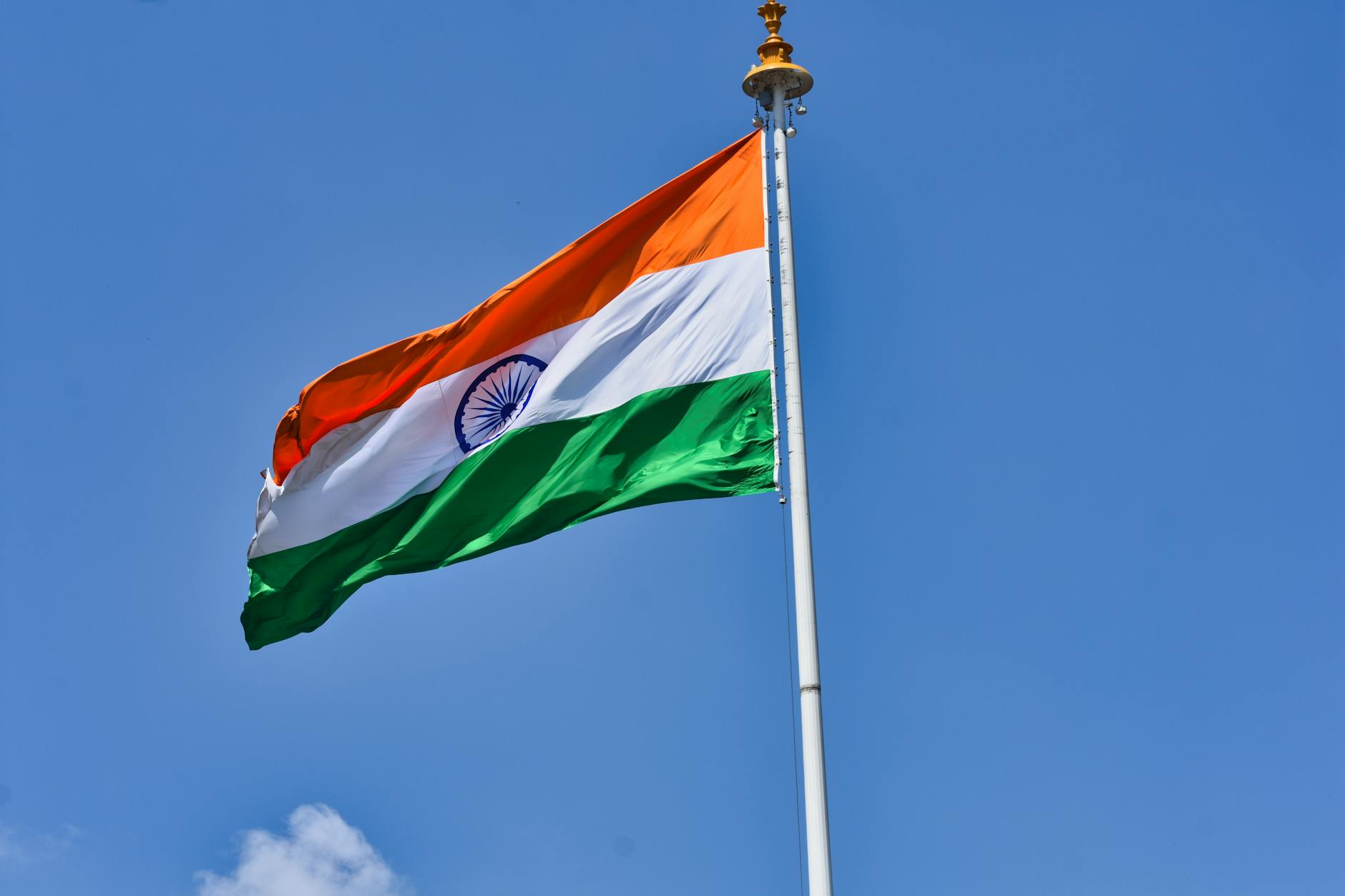Indian flag flying prominently representing the nation's demographic milestone