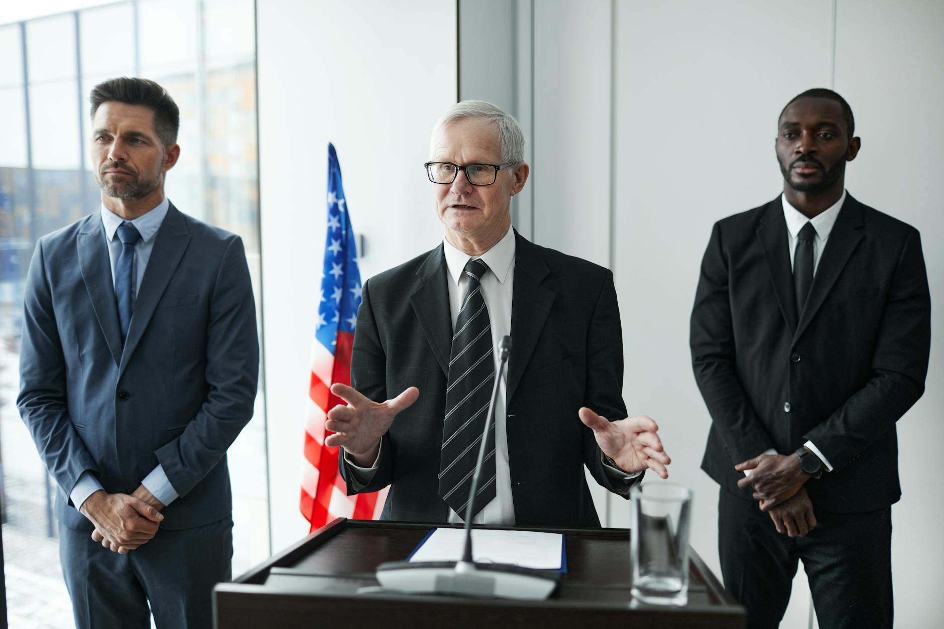 American flag displayed behind speaking podium for political events