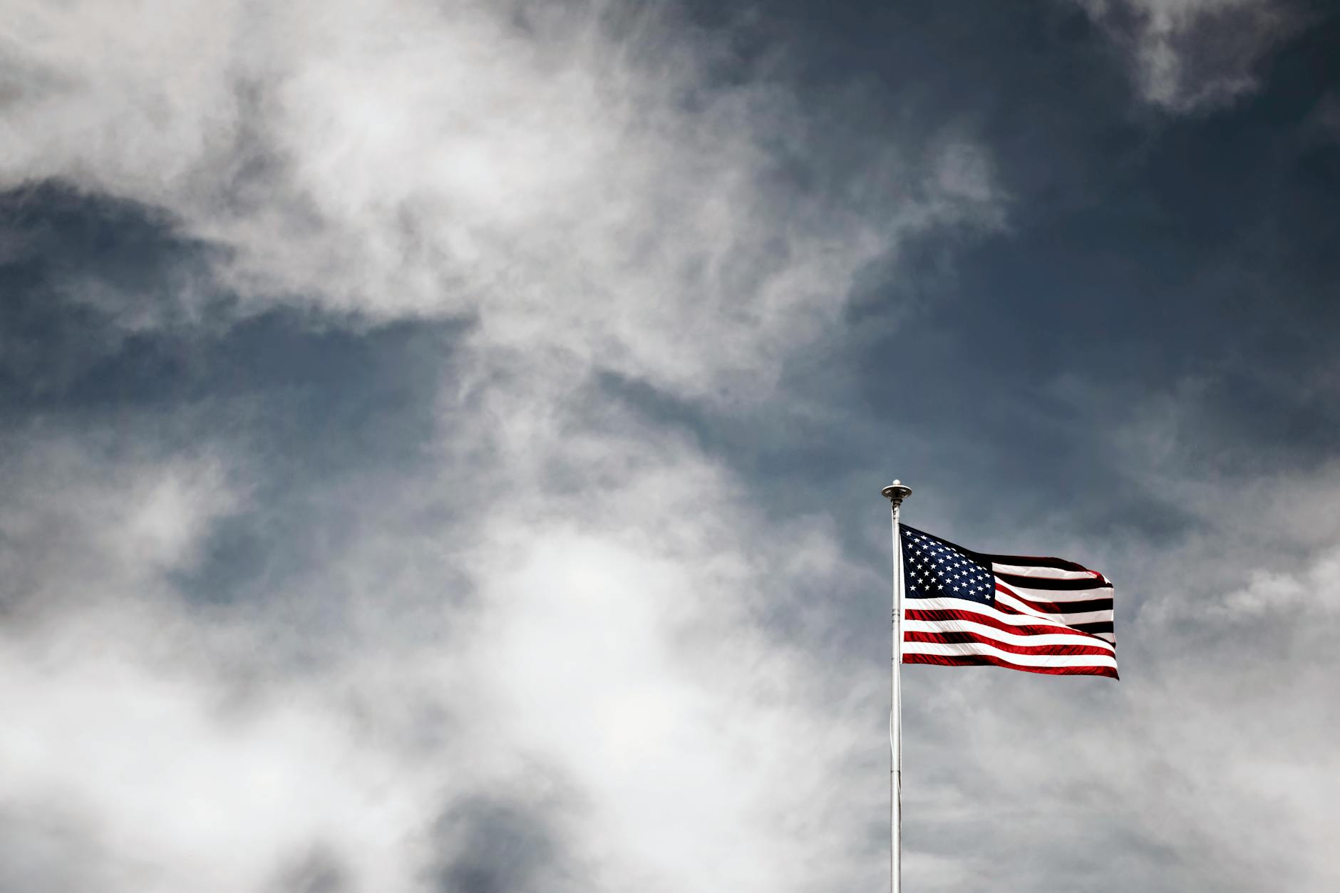 American flag waving representing constitutional and federal-state government relations