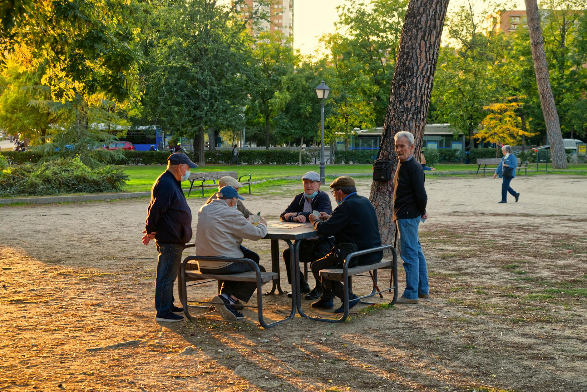 Group of elderly people sitting together, representing families waiting for reunion opportunities