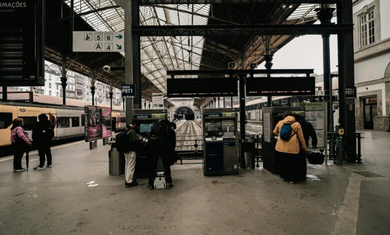 Busy train station platform with passengers waiting for transport