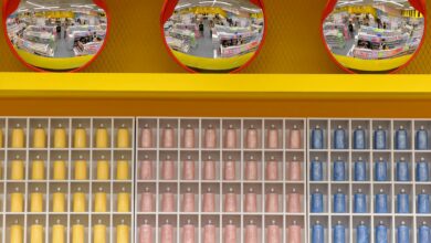 Wide view of a warehouse grocery store aisle stocked with bulk private label products