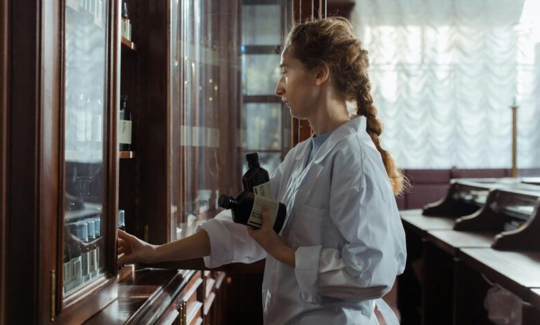 Modern pharmacy interior with consultation counter and medication shelves
