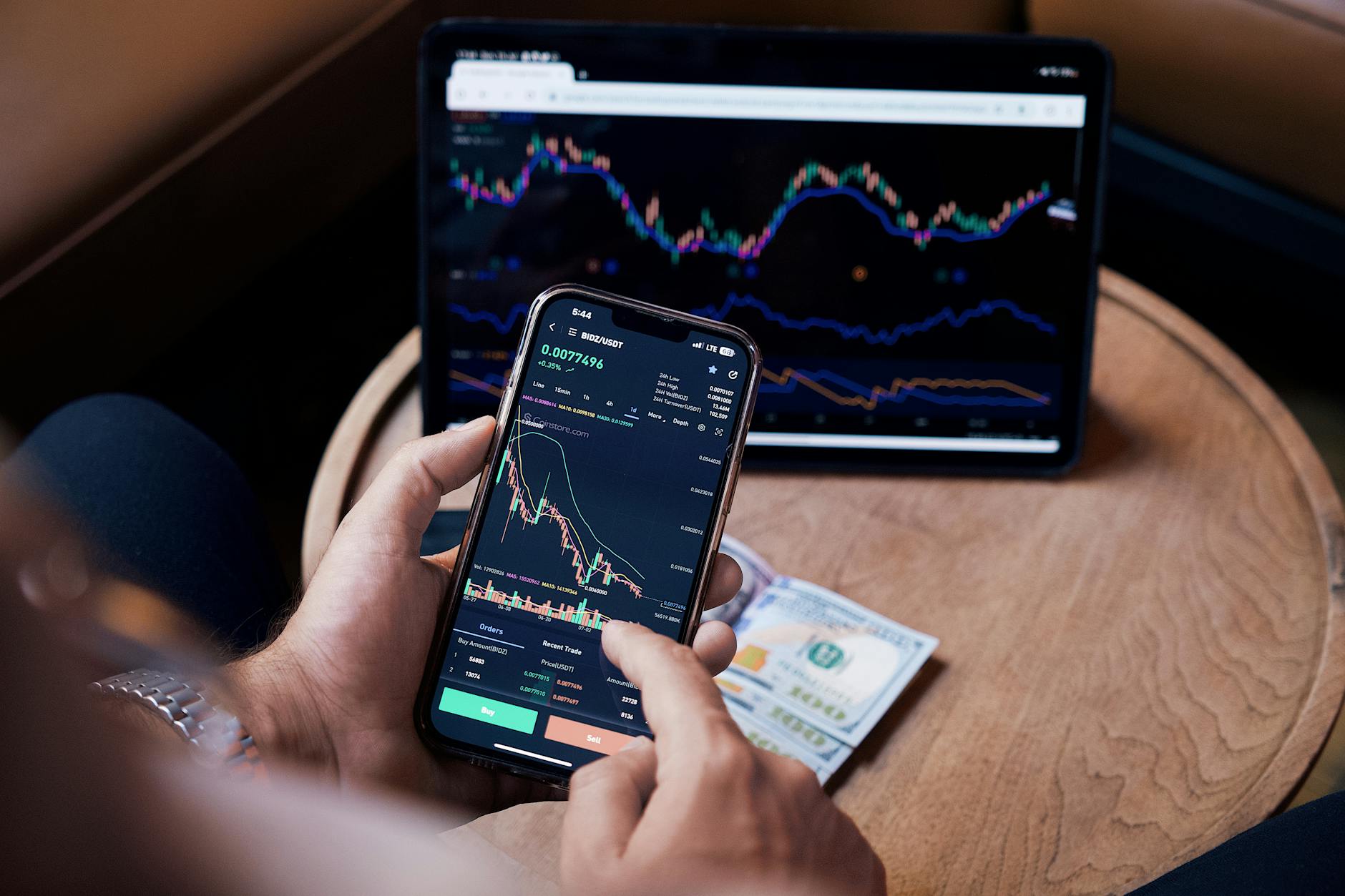 Financial traders monitoring stock market screens in a trading environment