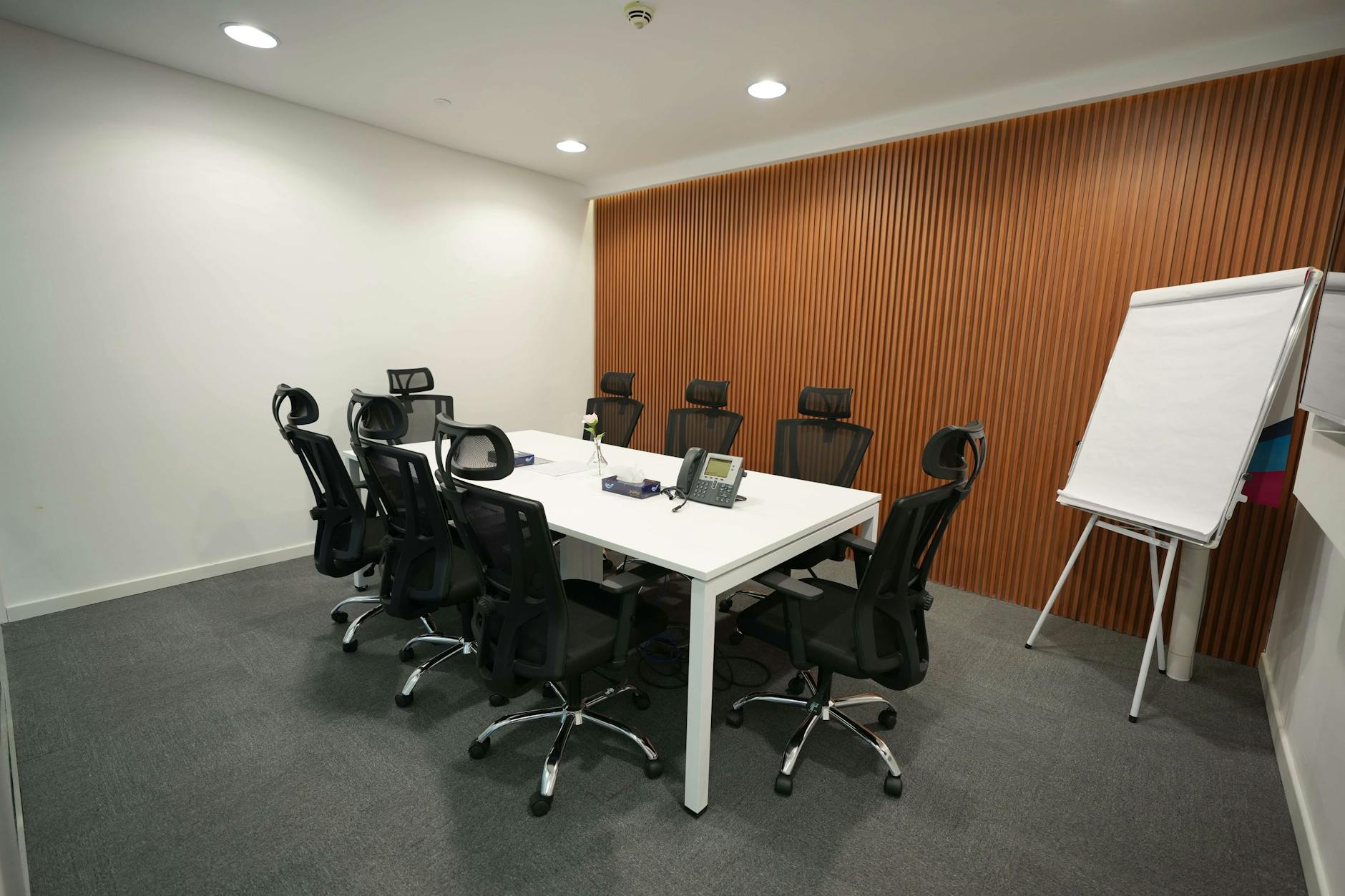 Professional meeting room inside a financial institution, representing lending decisions and underwriting review