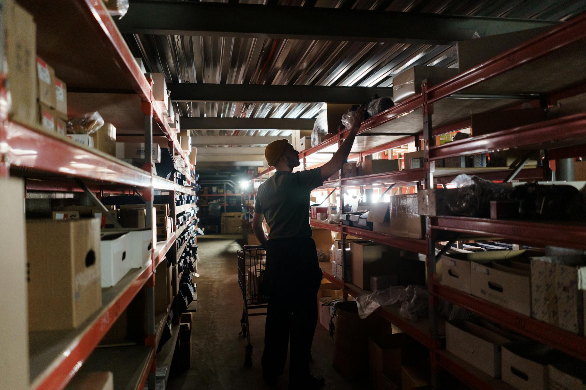 Automated package sorting conveyor system in modern distribution warehouse