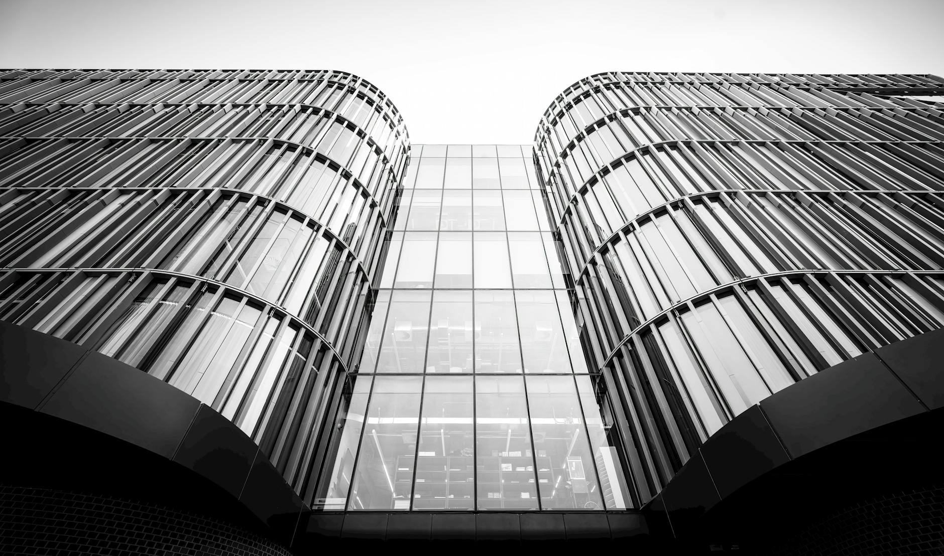 Modern technology company office building representing big tech regulatory scrutiny