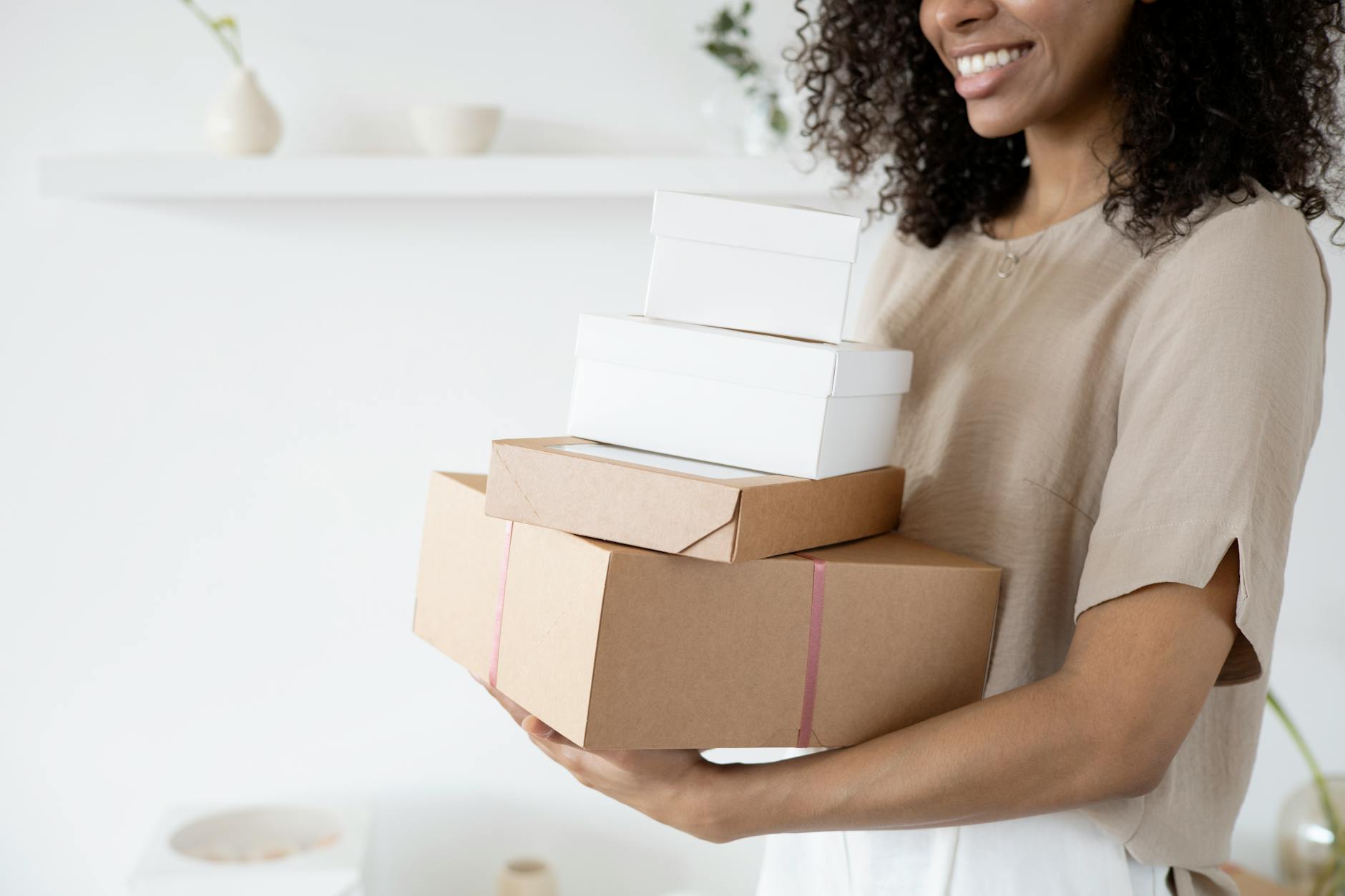 A cardboard delivery package placed on a doorstep representing e-commerce home delivery