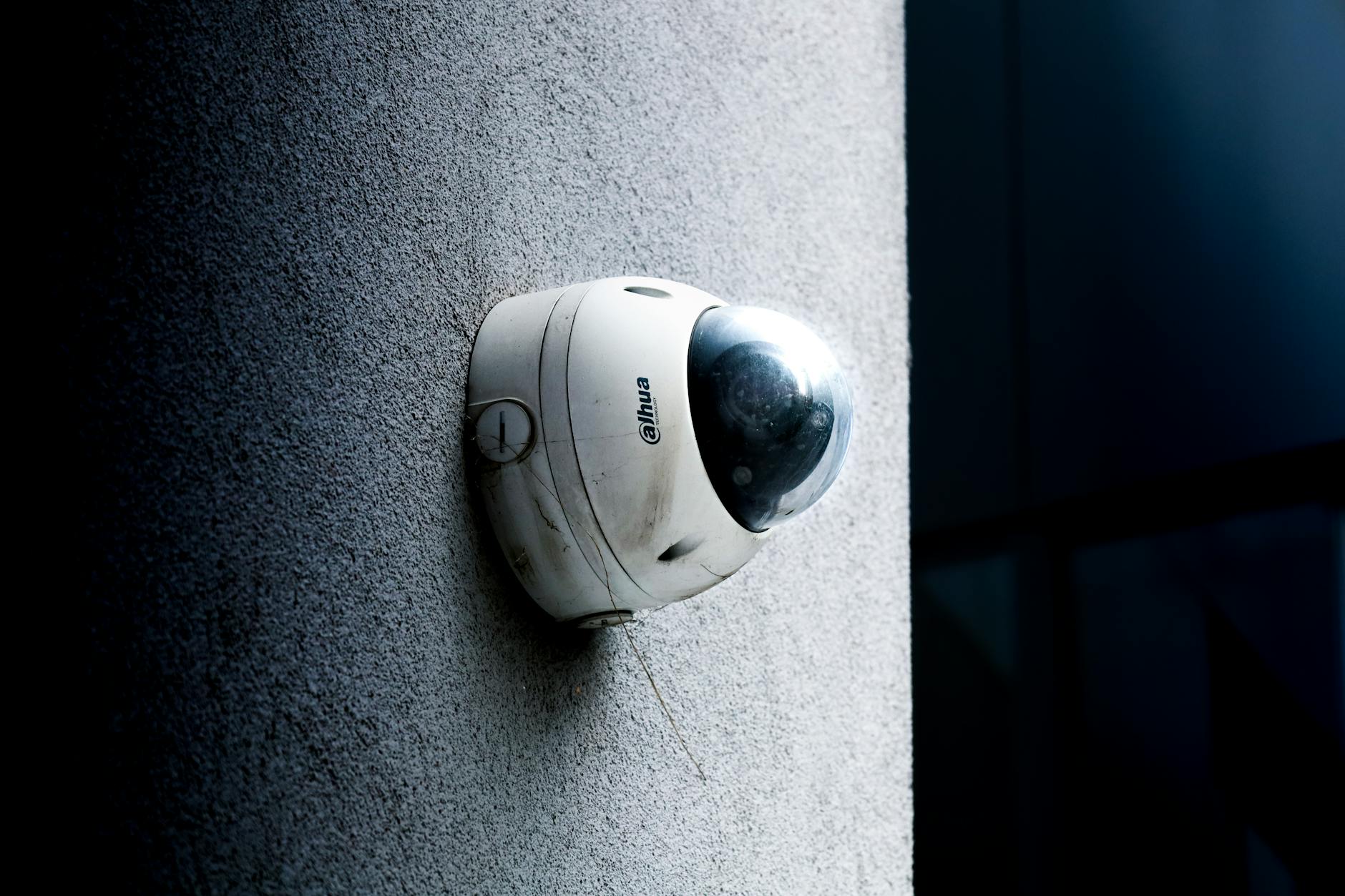 Security camera mounted in retail store for loss prevention monitoring