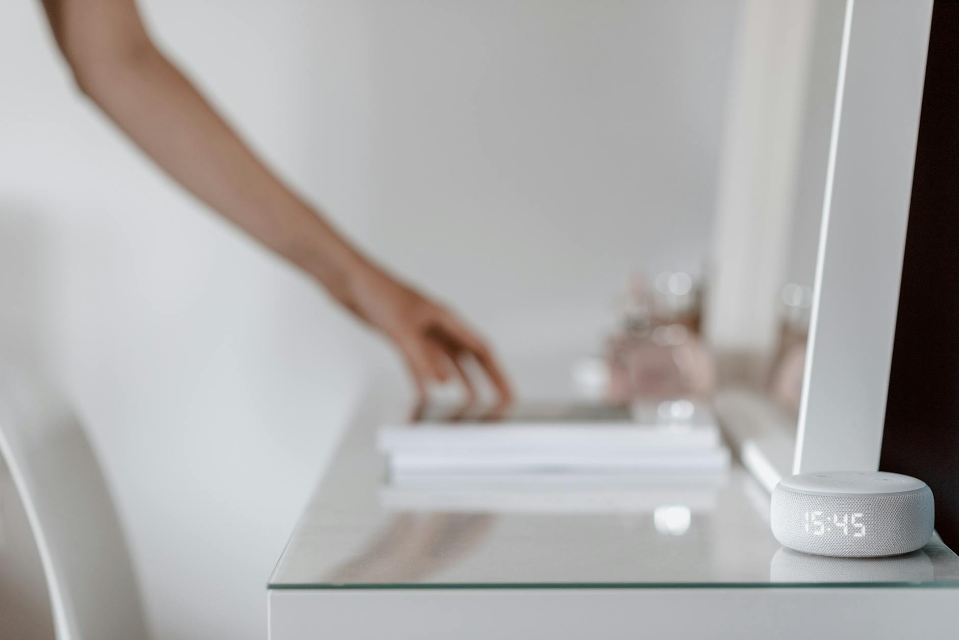 Amazon Echo smart speaker sitting on a kitchen counter in a modern home