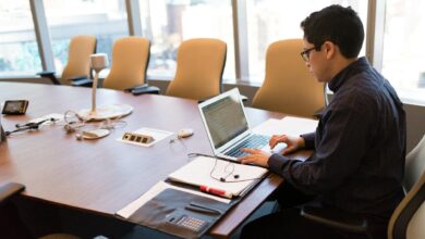 Business professionals discussing AI technology strategy in a corporate meeting room