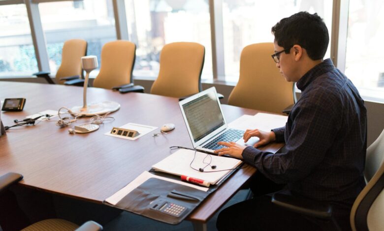 Business professionals discussing AI technology strategy in a corporate meeting room