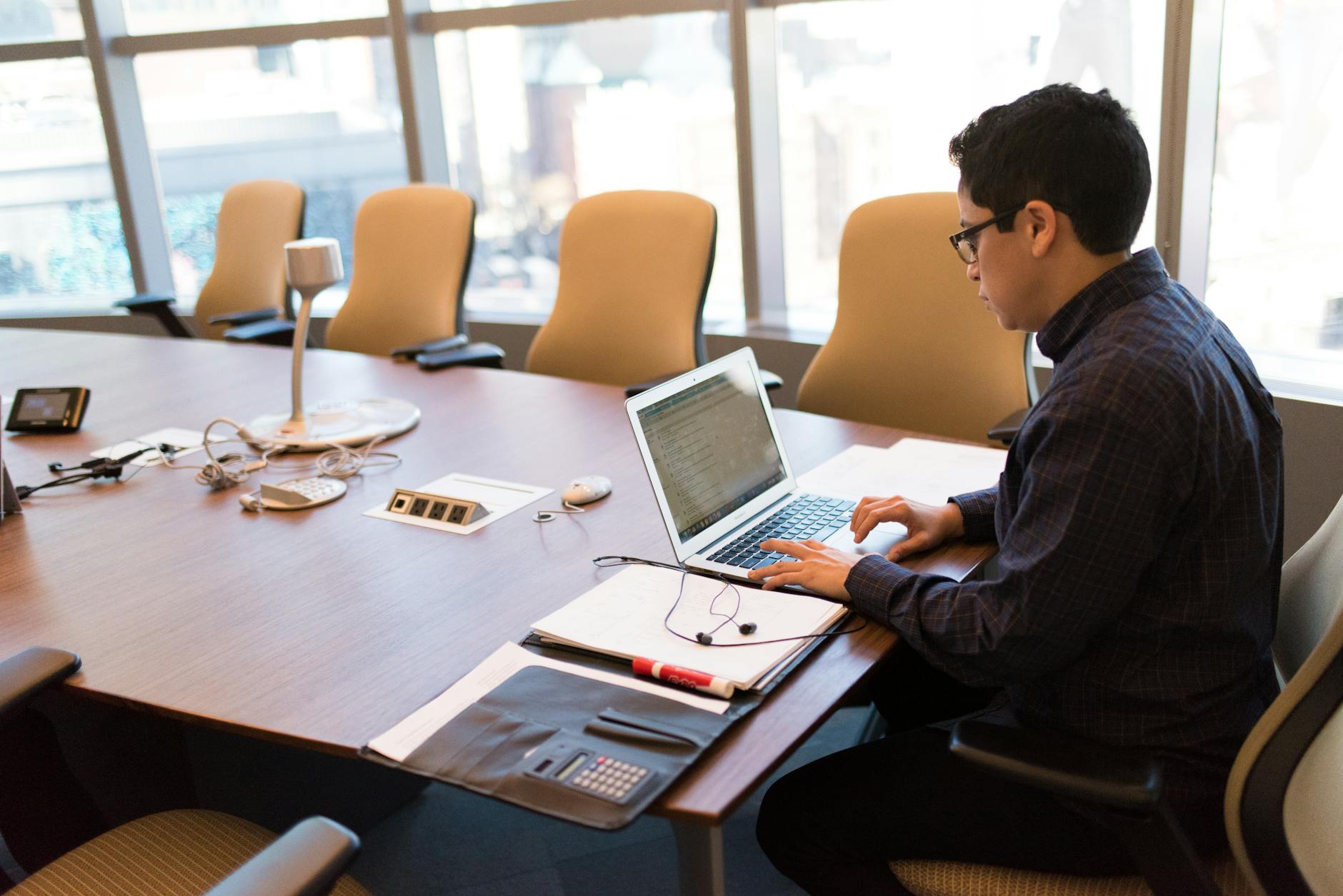 Business professionals discussing AI technology strategy in a corporate meeting room