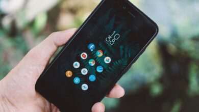 Person scrolling through a social media app on a smartphone