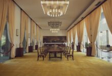 Two world leaders seated at a formal diplomatic table during a bilateral meeting